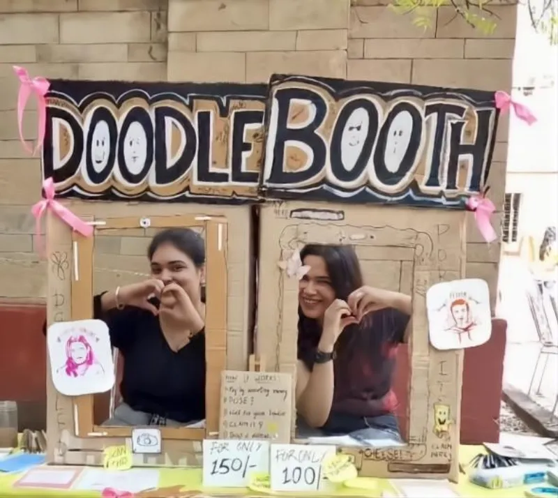 The Palette Pals doodle booth set up at an event